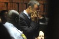 Pistorius vows to fight murder charge