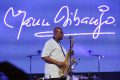 (FILES) In this file photo taken on June 30, 2018 Emmanuel N'Djoke Dibango, known as Manu Dibango, saxophonist and Franco-Cameroonian singer of world jazz, performs during his concert at the Ivory Hotel in Abidjan. - 'We are builders of bridges between the West and Africa, it's a chance' says African music legend and ambassador of Afro-jazz Manu Dibango, who looks back at 60 years of an exceptional career, with always so many projects of musical crossbreeding. (Photo by Sia KAMBOU / AFP)